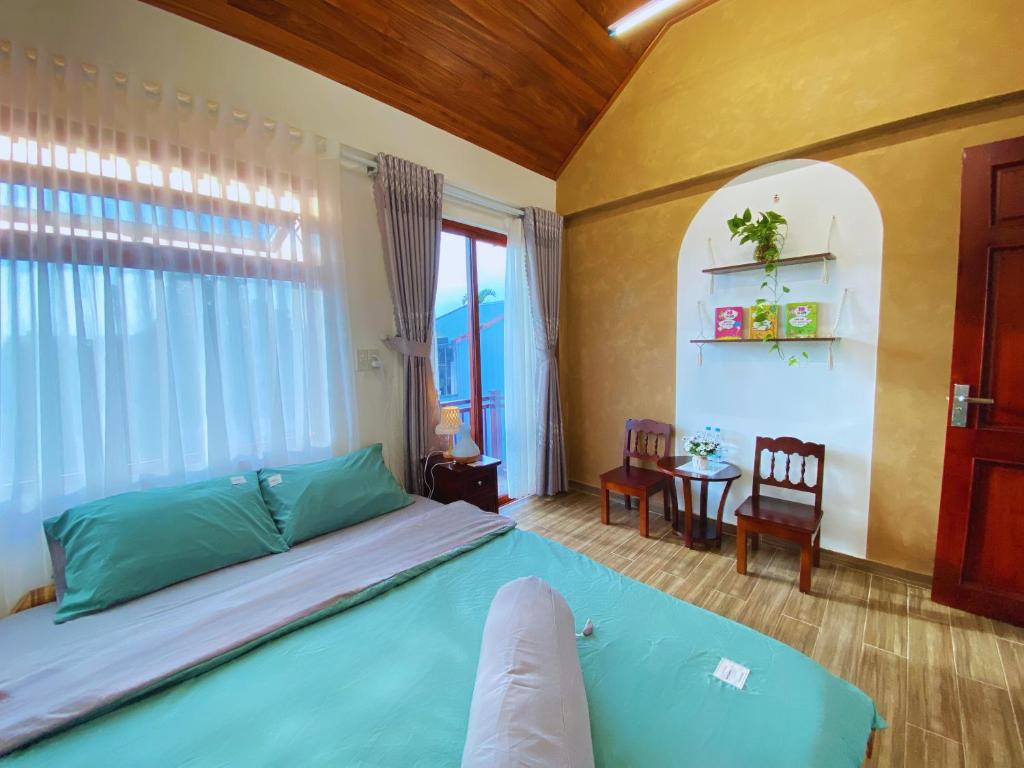 Postel nebo postele na pokoji v ubytování Tâm Family Homestay-Huế