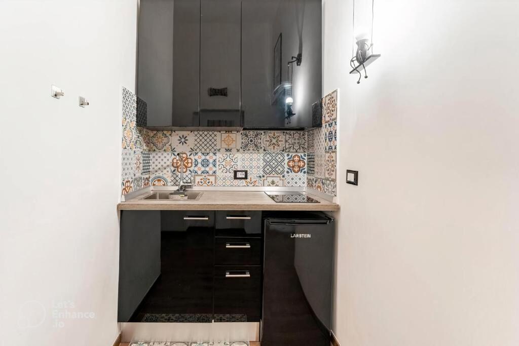 Kuchyňa alebo kuchynka v ubytovaní CASA DI SILVIA a PORTA PIA