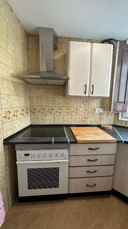 Kuchyňa alebo kuchynka v ubytovaní Apartamento acogedor en La Molina, 2hab, Wi Fi