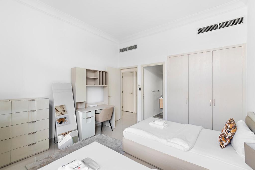 Postel nebo postele na pokoji v ubytování StoneTree - Pelham Villa 3 BR - Damac Hills