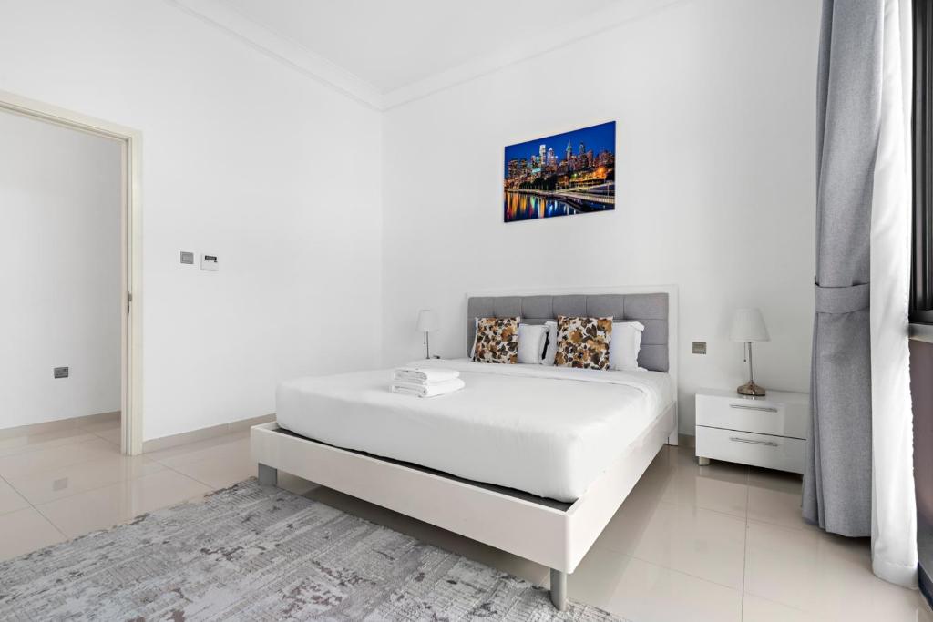 Postel nebo postele na pokoji v ubytování StoneTree - Pelham Villa 3 BR - Damac Hills
