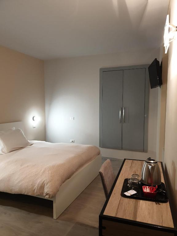 Postel nebo postele na pokoji v ubytování Piccolo Hotel Olina