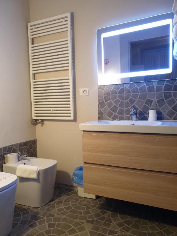 Koupelna v ubytování Piccolo Hotel Olina