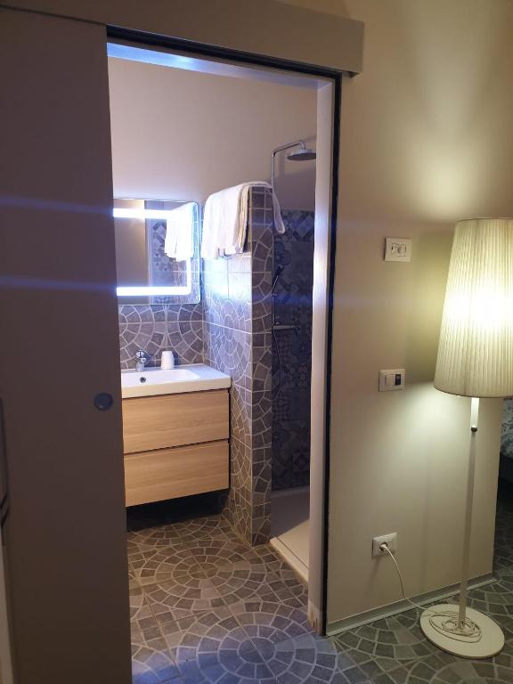 Koupelna v ubytování Piccolo Hotel Olina