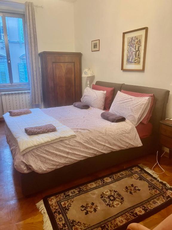 Posteľ alebo postele v izbe v ubytovaní Alla Scalinata del Teatro Rossetti parcheggio