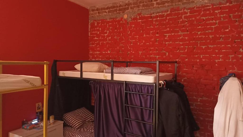 Postel nebo postele na pokoji v ubytování NEWBORN CENTER hostel ALL DAY FREE COFFEE