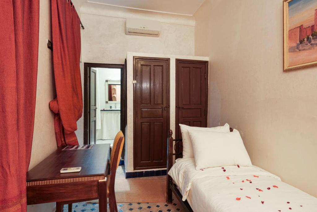 Postel nebo postele na pokoji v ubytování Riad Azalia