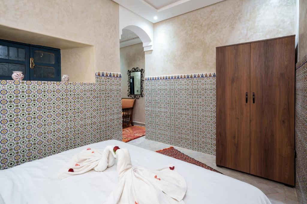 Postel nebo postele na pokoji v ubytování Riad Azalia