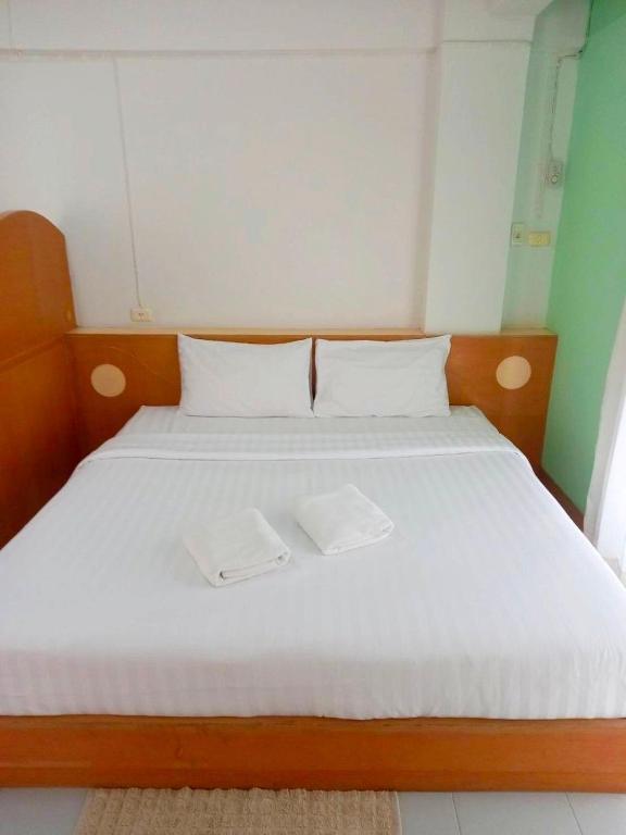 Postel nebo postele na pokoji v ubytování Mansion Sarasinee @ Chatuchak