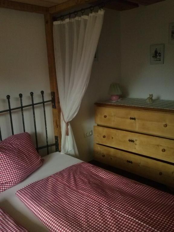 A bed or beds in a room at Haus Mehrl