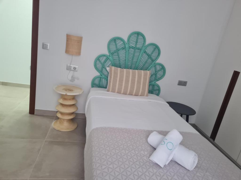 Postel nebo postele na pokoji v ubytování Sabbia Suites Blue