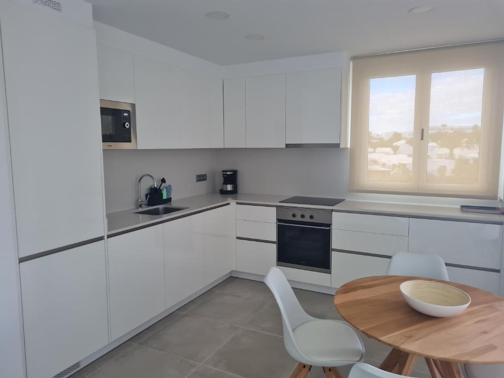 Kuchyň nebo kuchyňský kout v ubytování Sabbia Suites Blue
