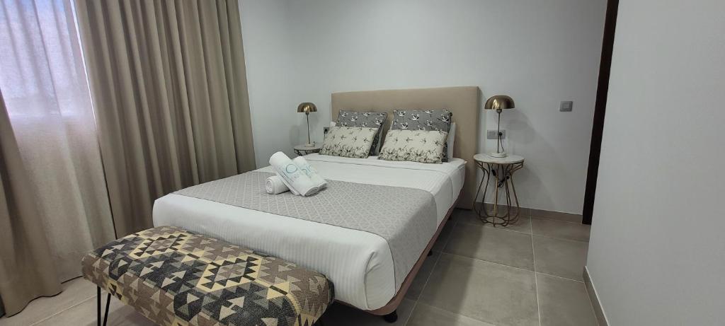 Postel nebo postele na pokoji v ubytování Sabbia Suites Blue