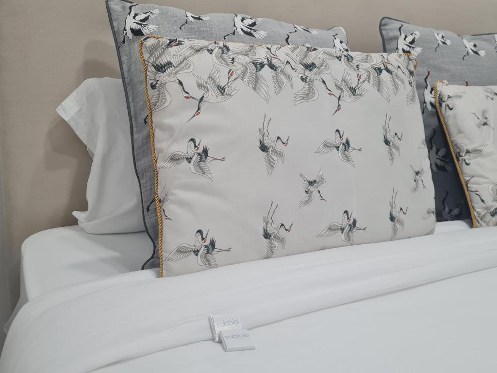 Postel nebo postele na pokoji v ubytování Sabbia Suites Blue