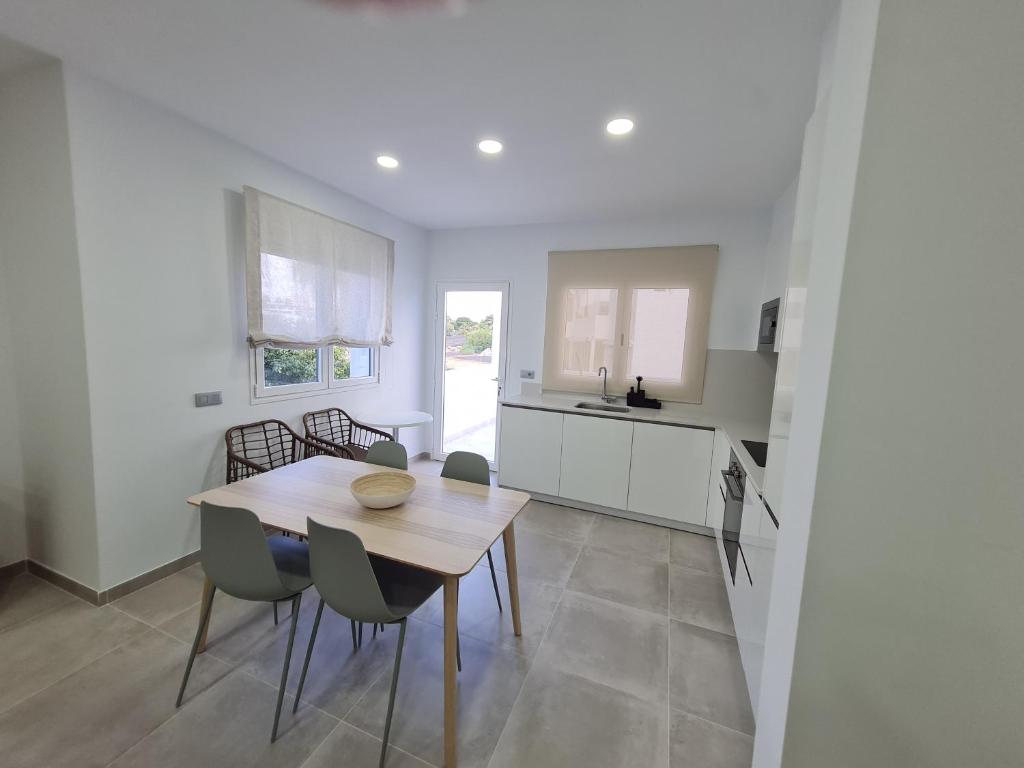 Kuchyň nebo kuchyňský kout v ubytování Sabbia Suites Blue