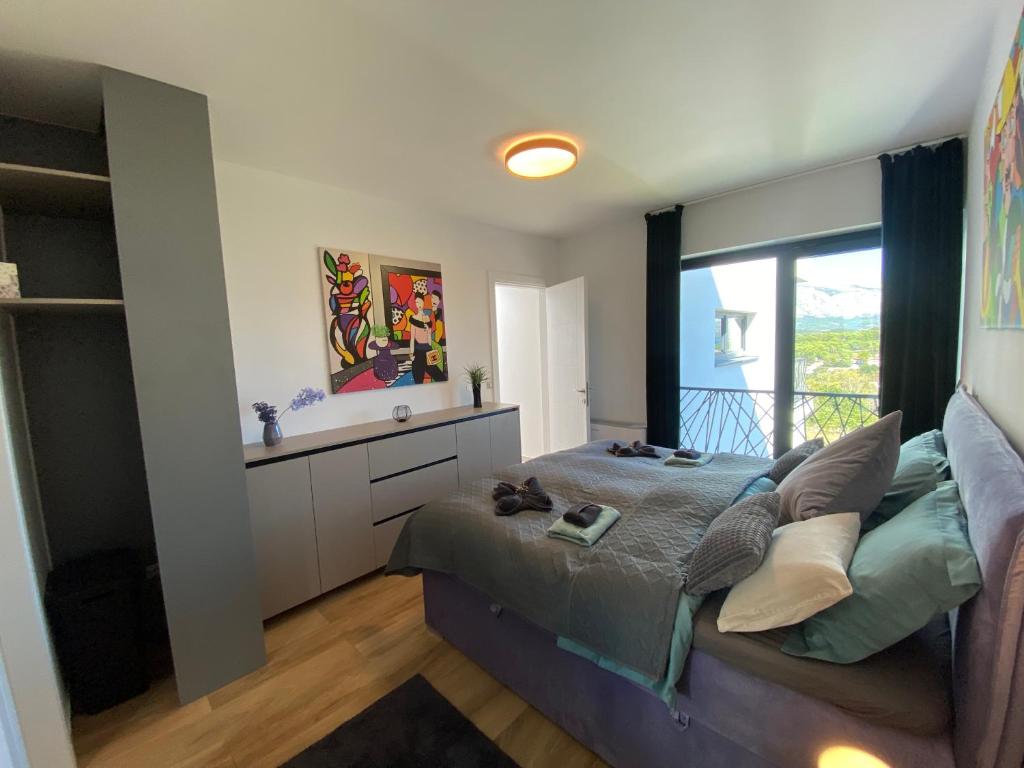 Posezení v ubytování Apartment Adria mit traumhaften Blick auf das Meer