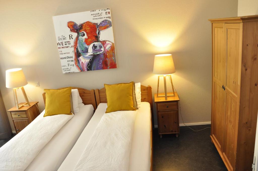 Postel nebo postele na pokoji v ubytování Hotel zum Hirschen