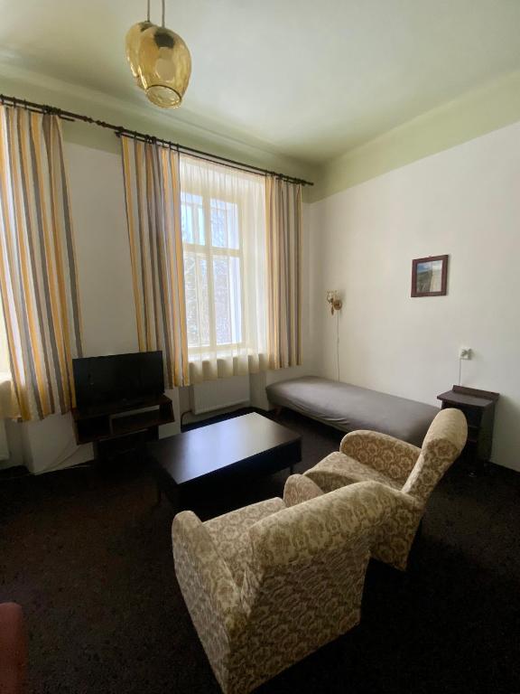 Ein Sitzbereich in der Unterkunft Apartma 299