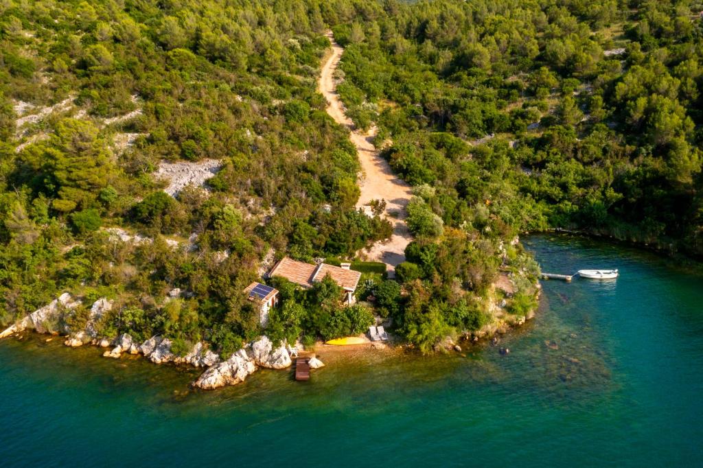 an aerial view of an island in the water at Holiday Home Paradise Beach in Šibenik