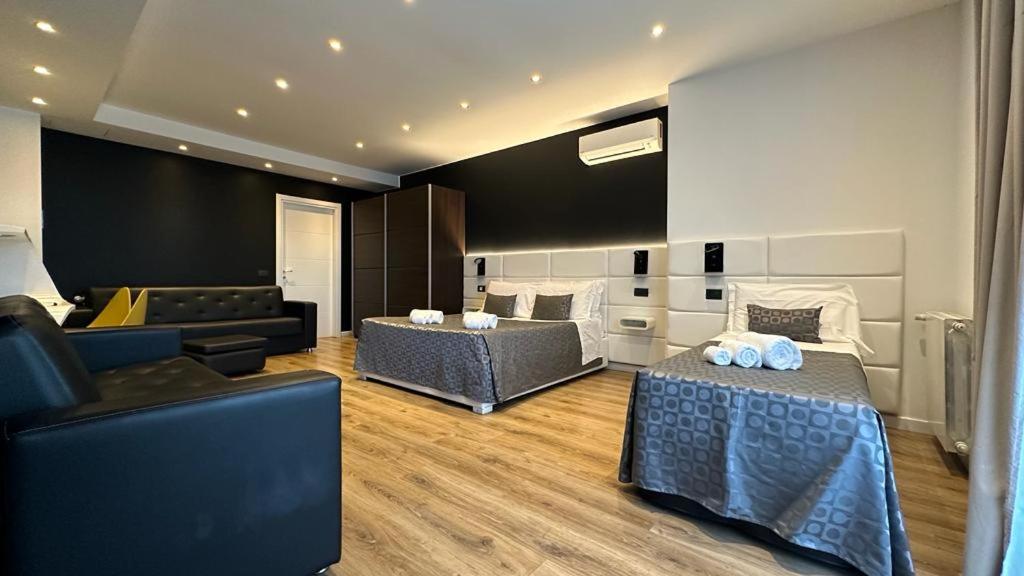 Un lugar para sentarse en Ottomood B&B and Apartments
