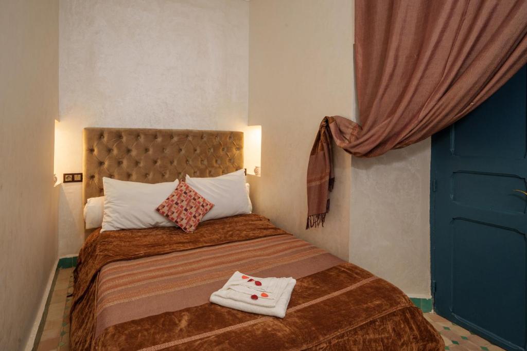 Postel nebo postele na pokoji v ubytování Riad Azalia