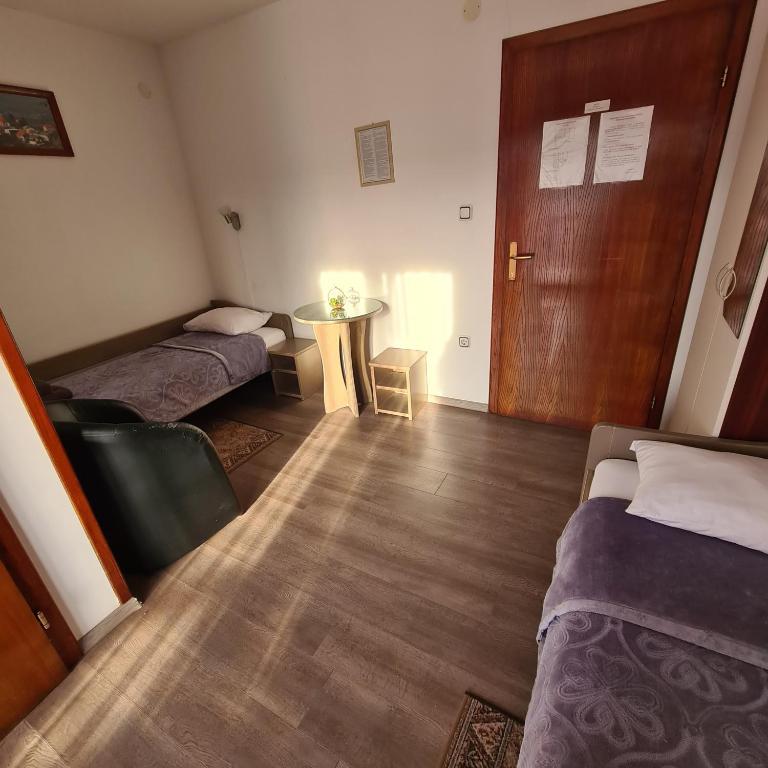 Posteľ alebo postele v izbe v ubytovaní Guesthouse Kod mosta