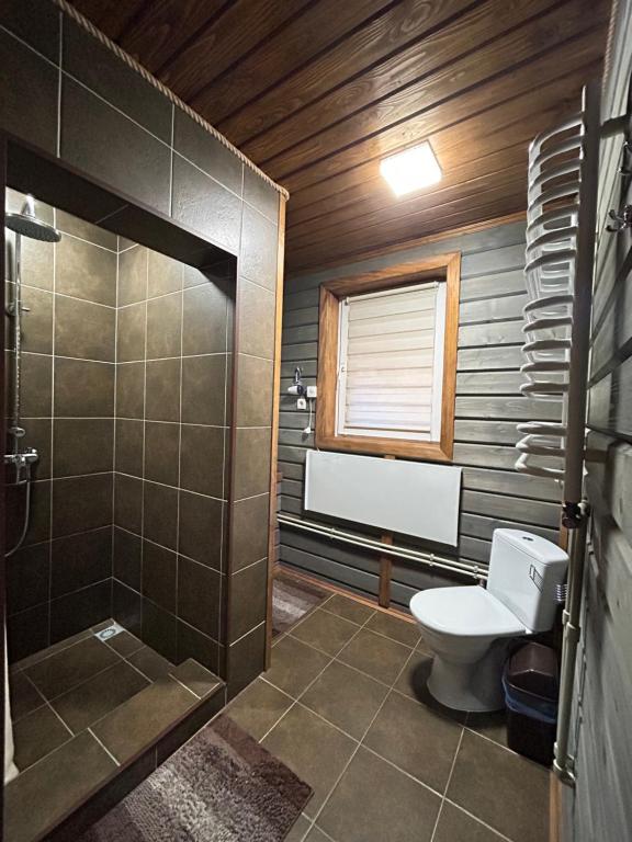 Koupelna v ubytování Guest House Kaspiy