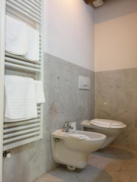 Koupelna v ubytování Piccolo Hotel Olina