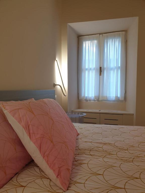 Postel nebo postele na pokoji v ubytování Piccolo Hotel Olina