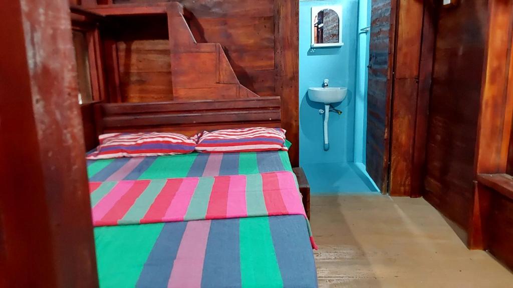 Postel nebo postele na pokoji v ubytování ULPATHA ECO LODGE