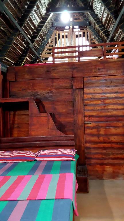 Postel nebo postele na pokoji v ubytování ULPATHA ECO LODGE