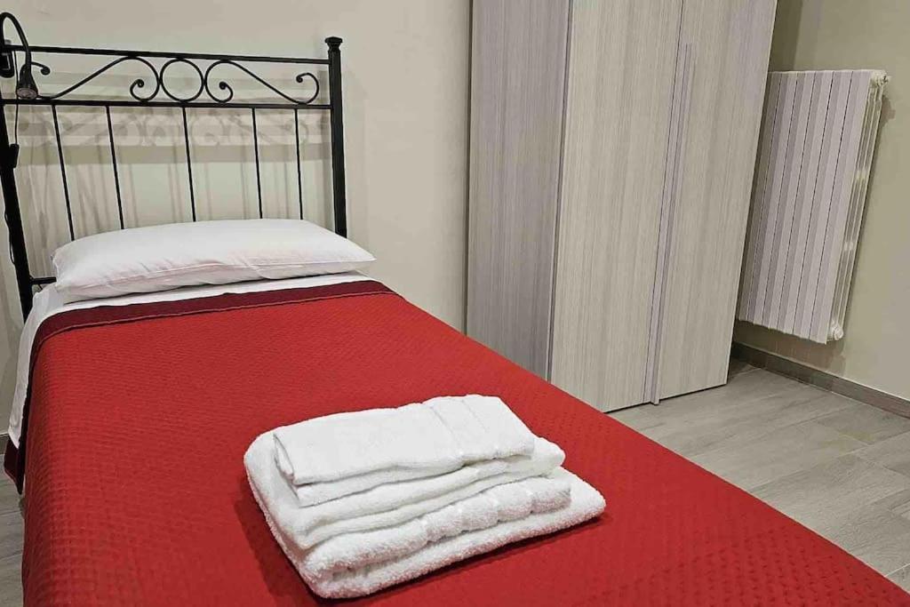 Letto o letti in una camera di Scala Paradiso ~ B&B Molfetta