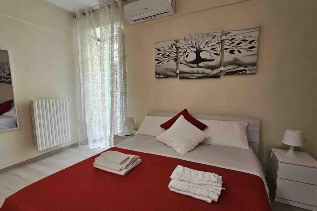 Letto o letti in una camera di Scala Paradiso ~ B&B Molfetta