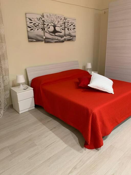 Letto o letti in una camera di Scala Paradiso ~ B&B Molfetta
