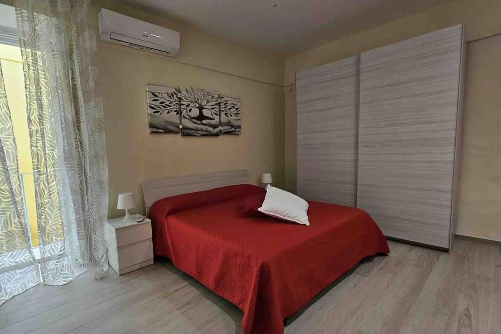 Letto o letti in una camera di Scala Paradiso ~ B&B Molfetta