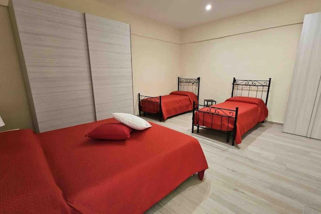 Letto o letti in una camera di Scala Paradiso ~ B&B Molfetta