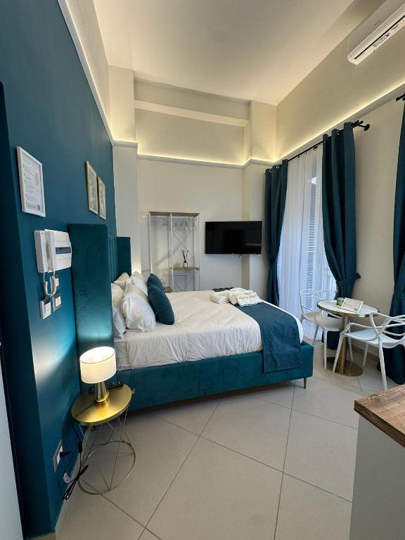 Postel nebo postele na pokoji v ubytování PALAZZOREFICI