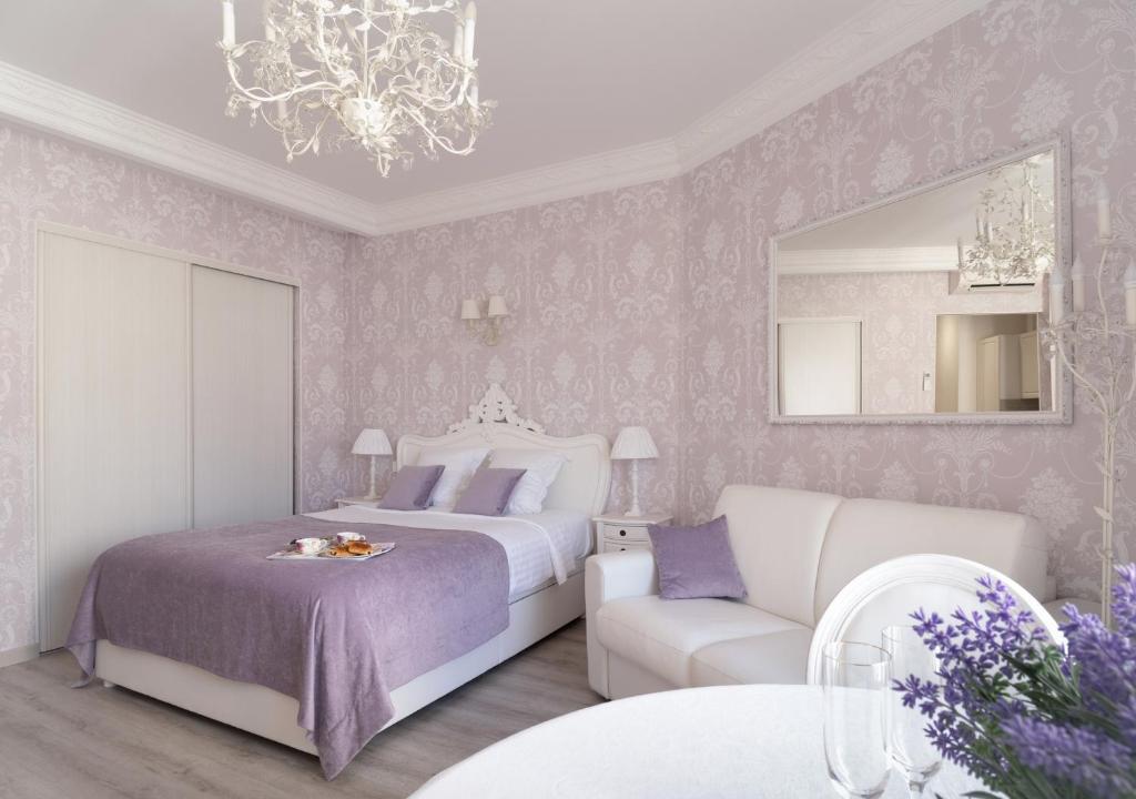 Palais Miramar Imperial Croisetteにあるベッド