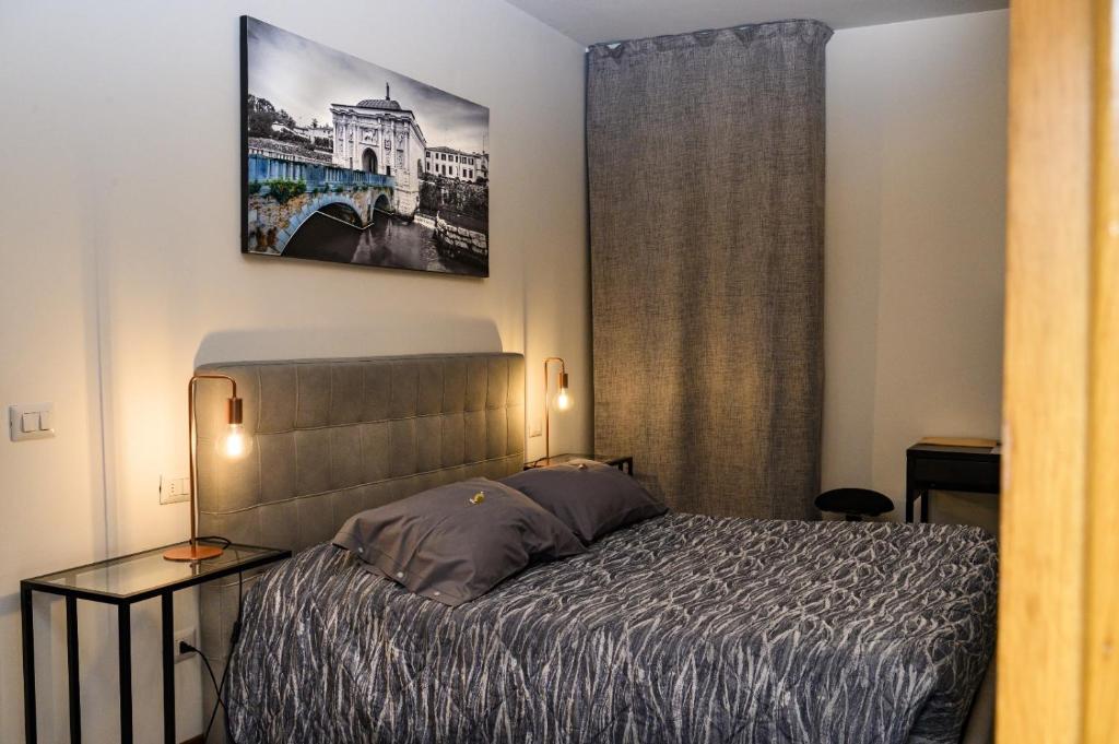 מיטה או מיטות בחדר ב-Villa Trevisi - ROOMS