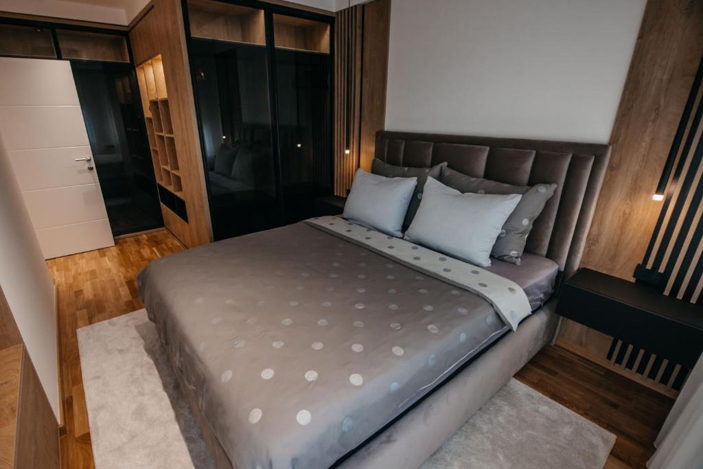 Postel nebo postele na pokoji v ubytování Apartman 37 Aranđelovac