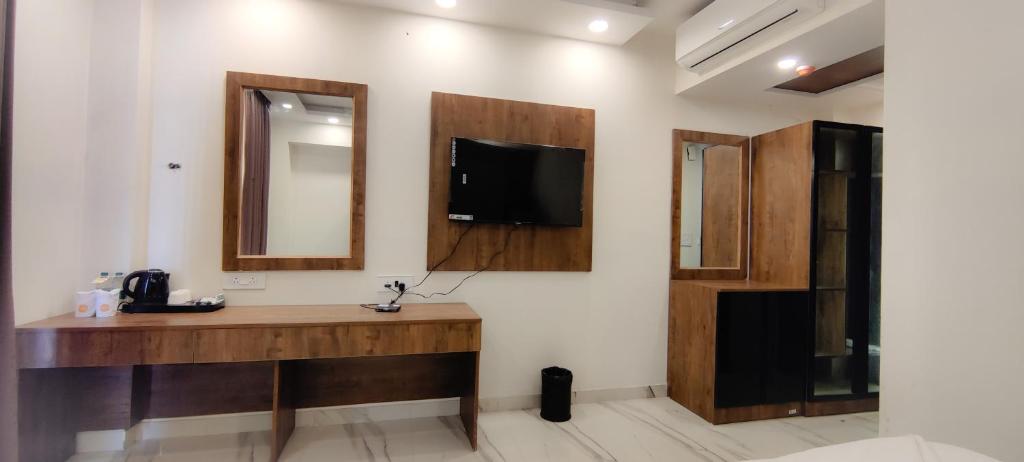 TV a/nebo společenská místnost v ubytování PK Boutique Hotel