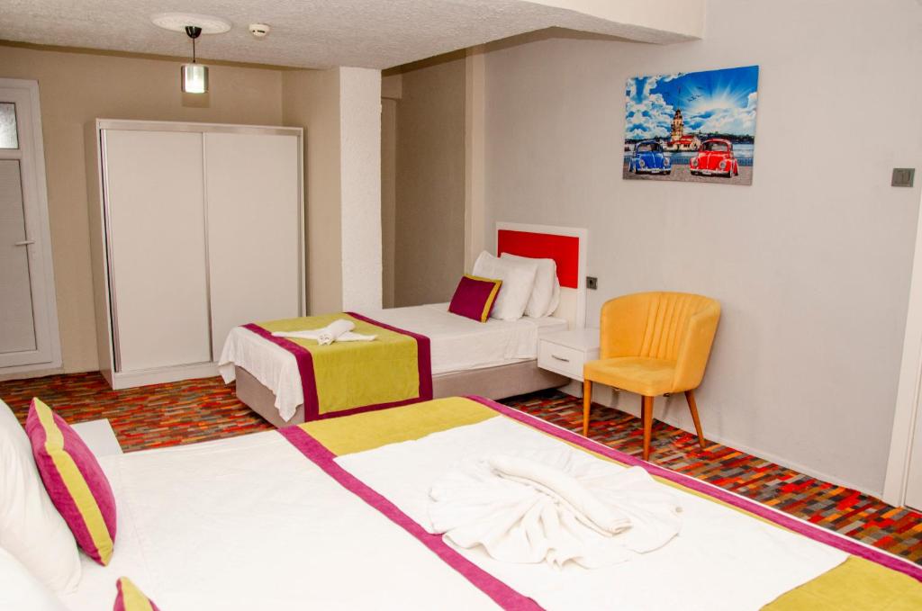 Ένα ή περισσότερα κρεβάτια σε δωμάτιο στο Ephesus Hera