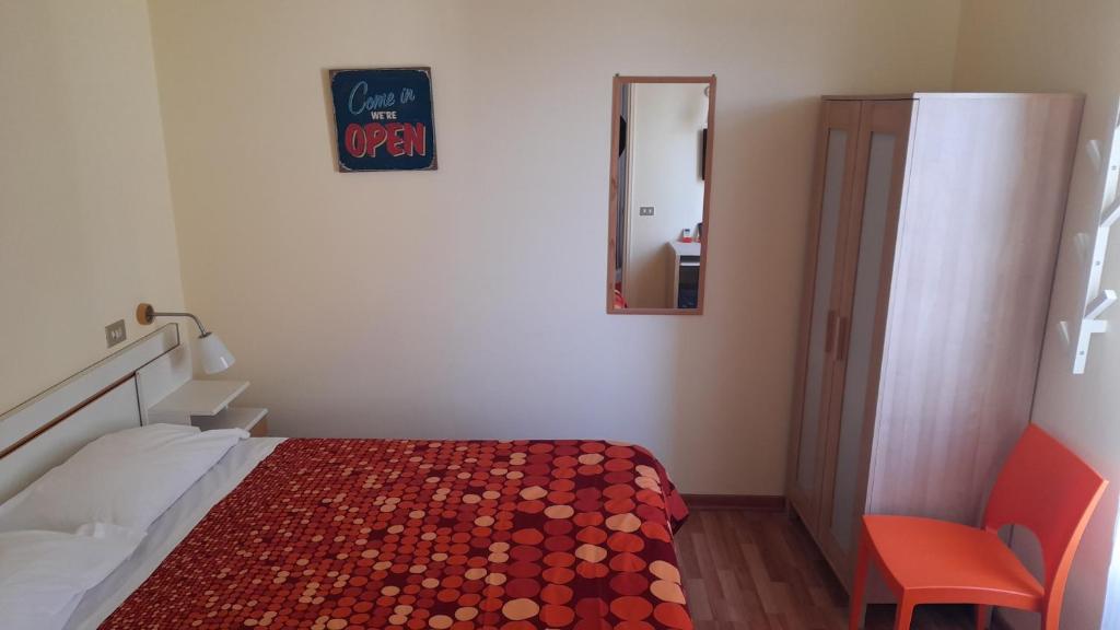 Postel nebo postele na pokoji v ubytování Albergo Villa Gaia