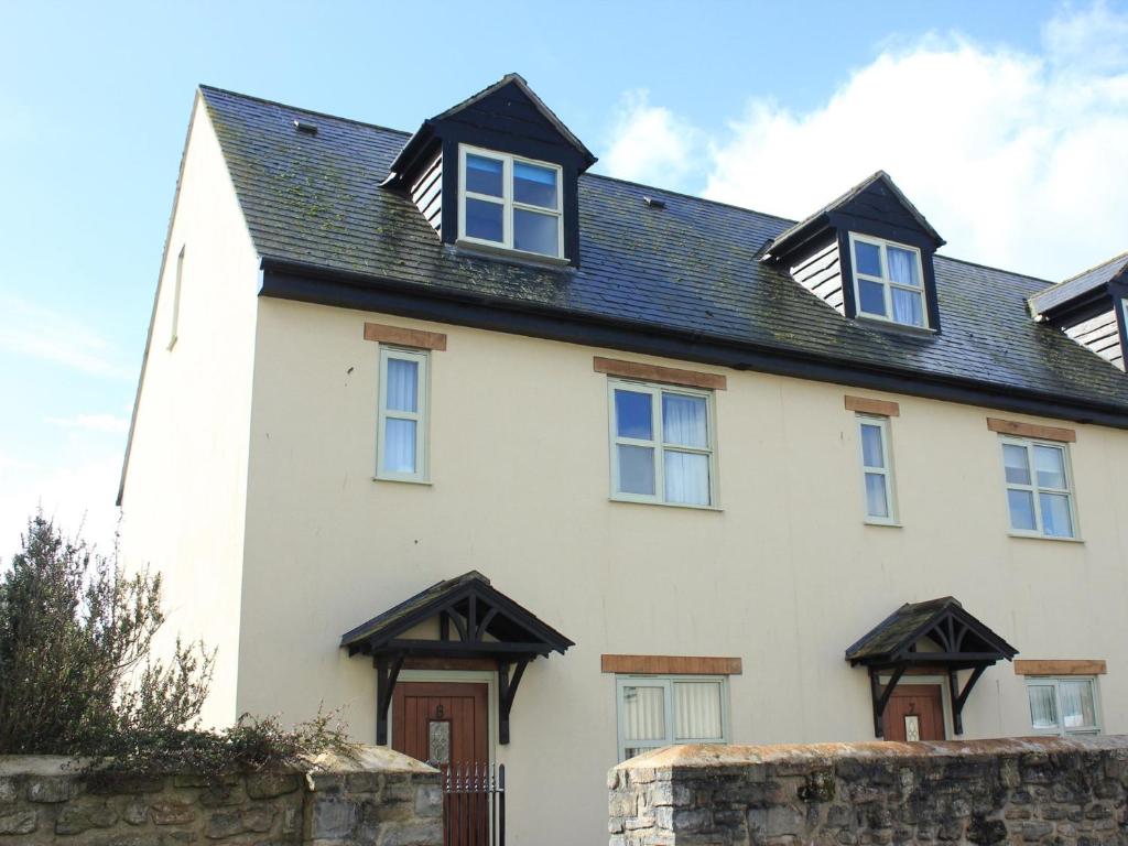 a white house with a black roof at 3 bed property in Watchet OLDMW in Watchet