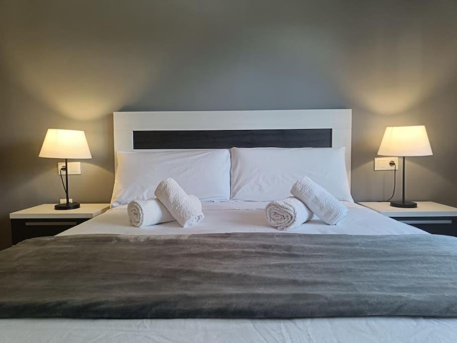 Ένα ή περισσότερα κρεβάτια σε δωμάτιο στο MAGNIFICO APARTAMENTO · PLAYA CANET DE BERENGUER