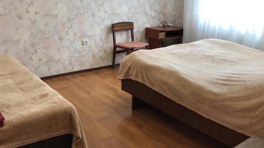 Postel nebo postele na pokoji v ubytování House of Grace