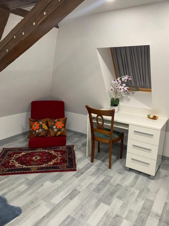 Posedenie v ubytovaní Chambre rustique avec double lit et sa salle de bain privée