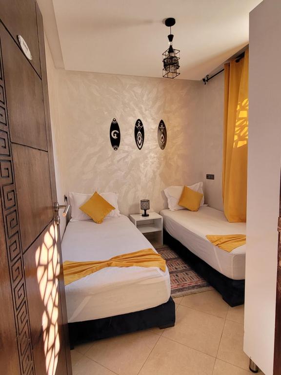 Katil atau katil-katil dalam bilik di imsouane bleu bay house