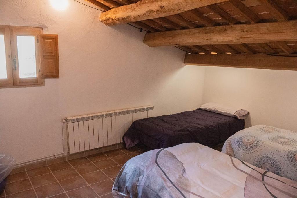 Postel nebo postele na pokoji v ubytování Mas el Cornut