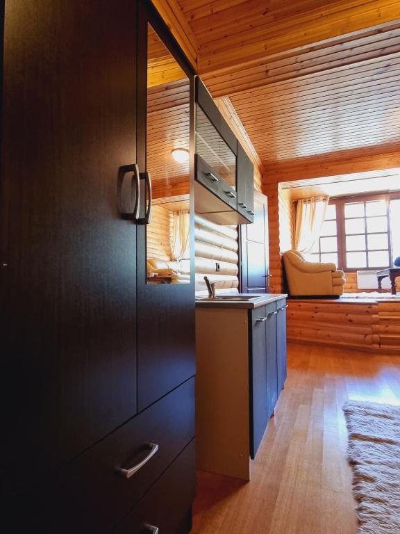 Kuchyň nebo kuchyňský kout v ubytování ''Nest'' The Wooden Suite by Ski Alure